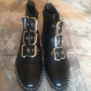 New Steve Madden black booties w/buckles detailed.